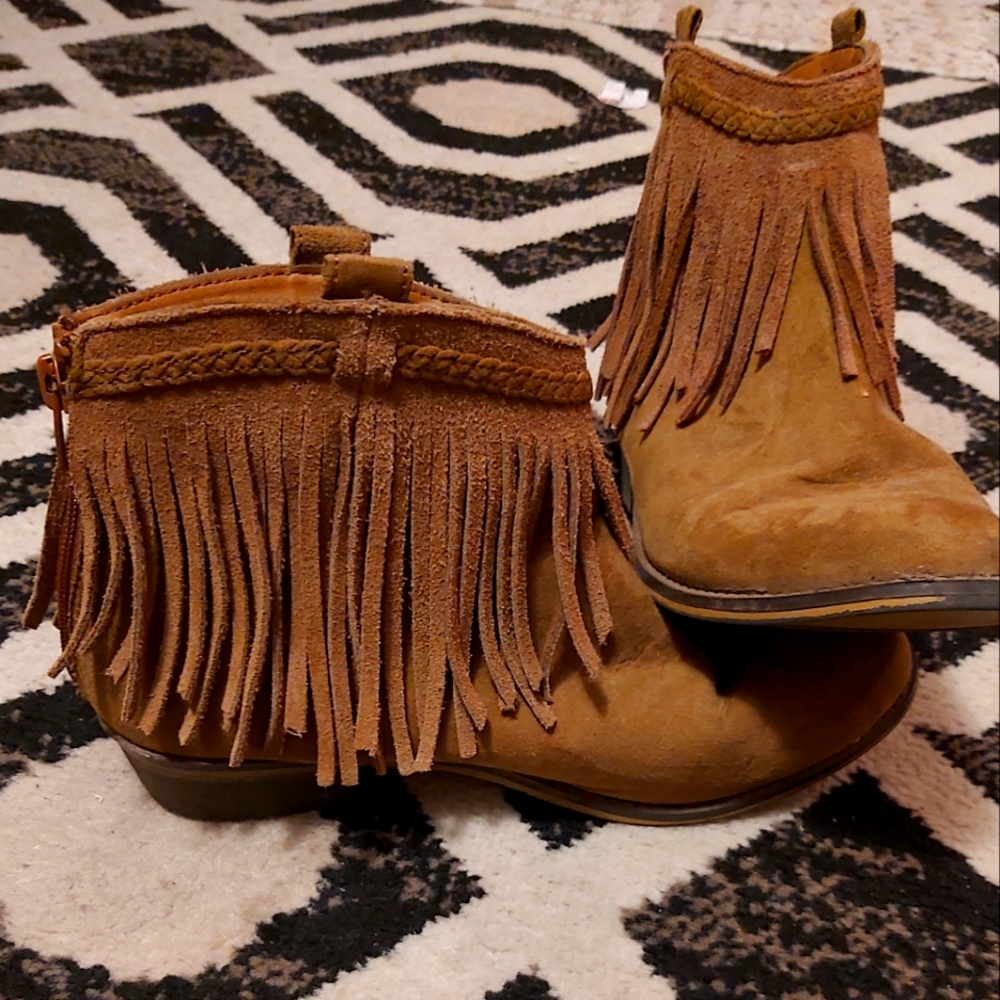 Brown flare boots.